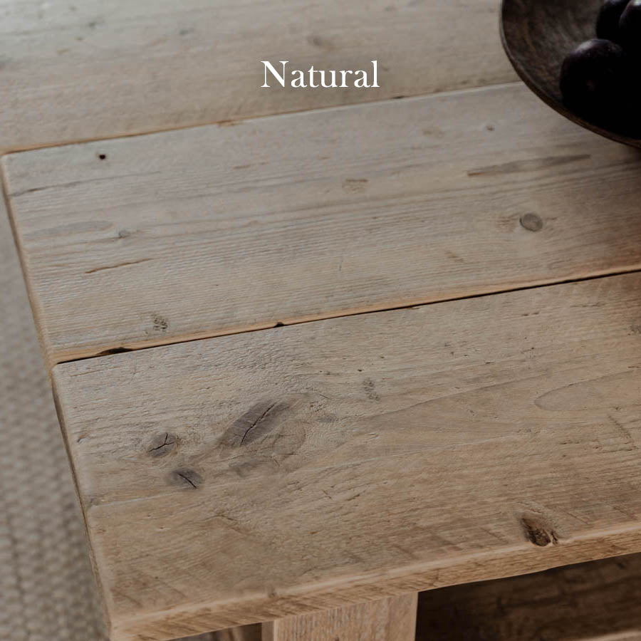 Reclaimed wood shelves with aged steel brackets