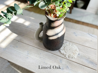 Reclaimed wood shelves with aged steel brackets